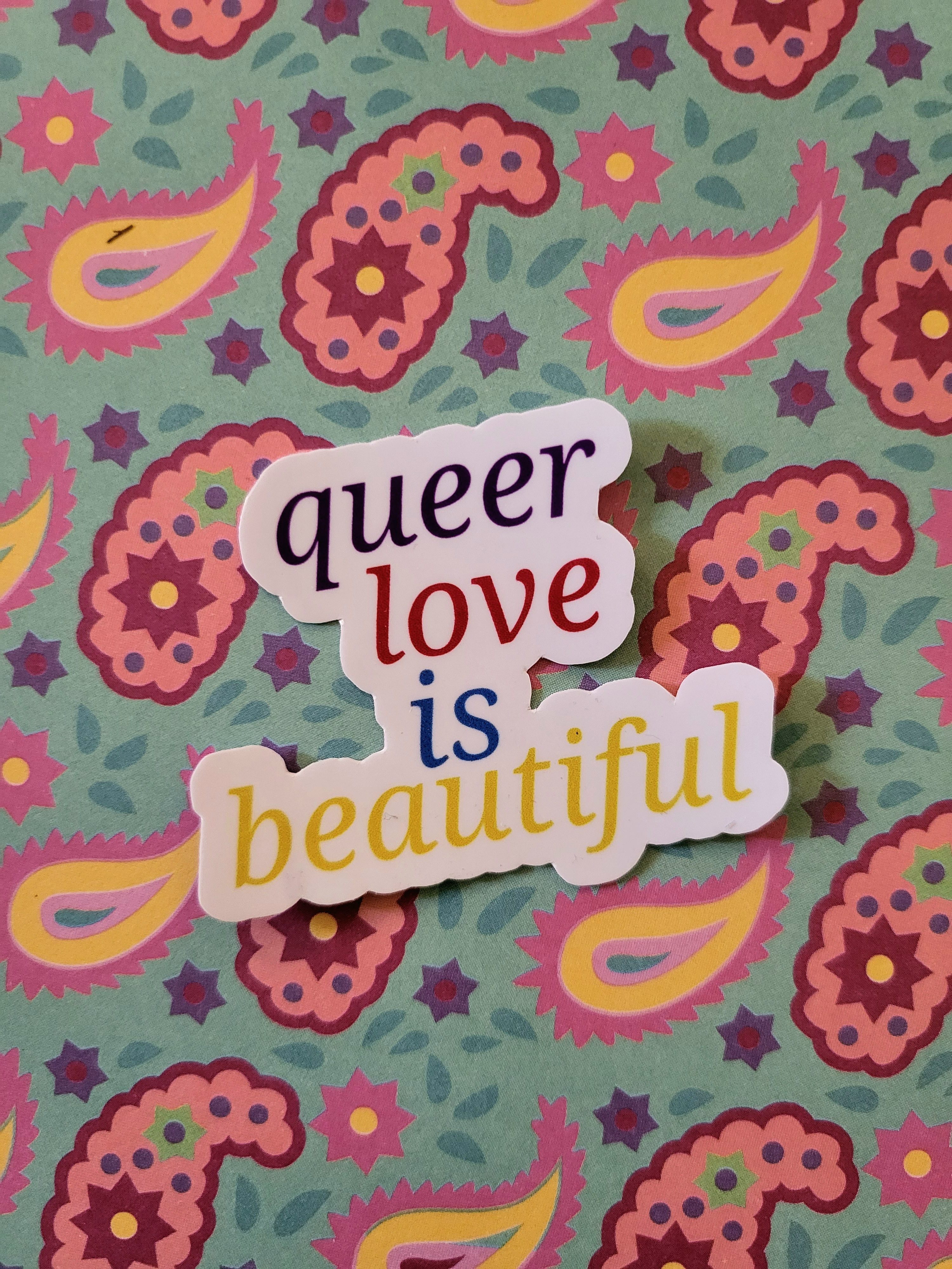 Sticker by KaspersKreations with text queer love is beautiful