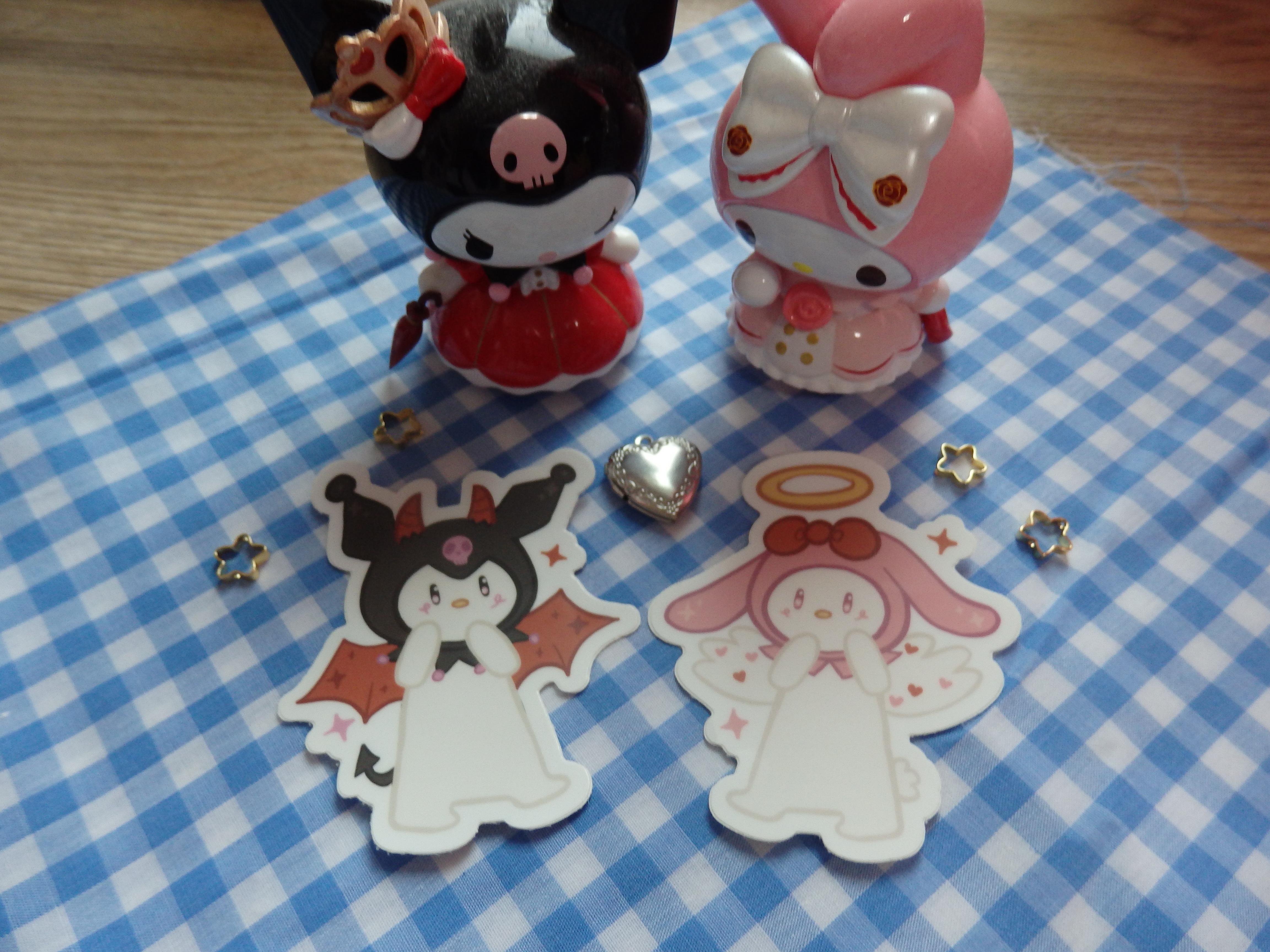oxokat's my melody and kuromi stickers displayed with figures